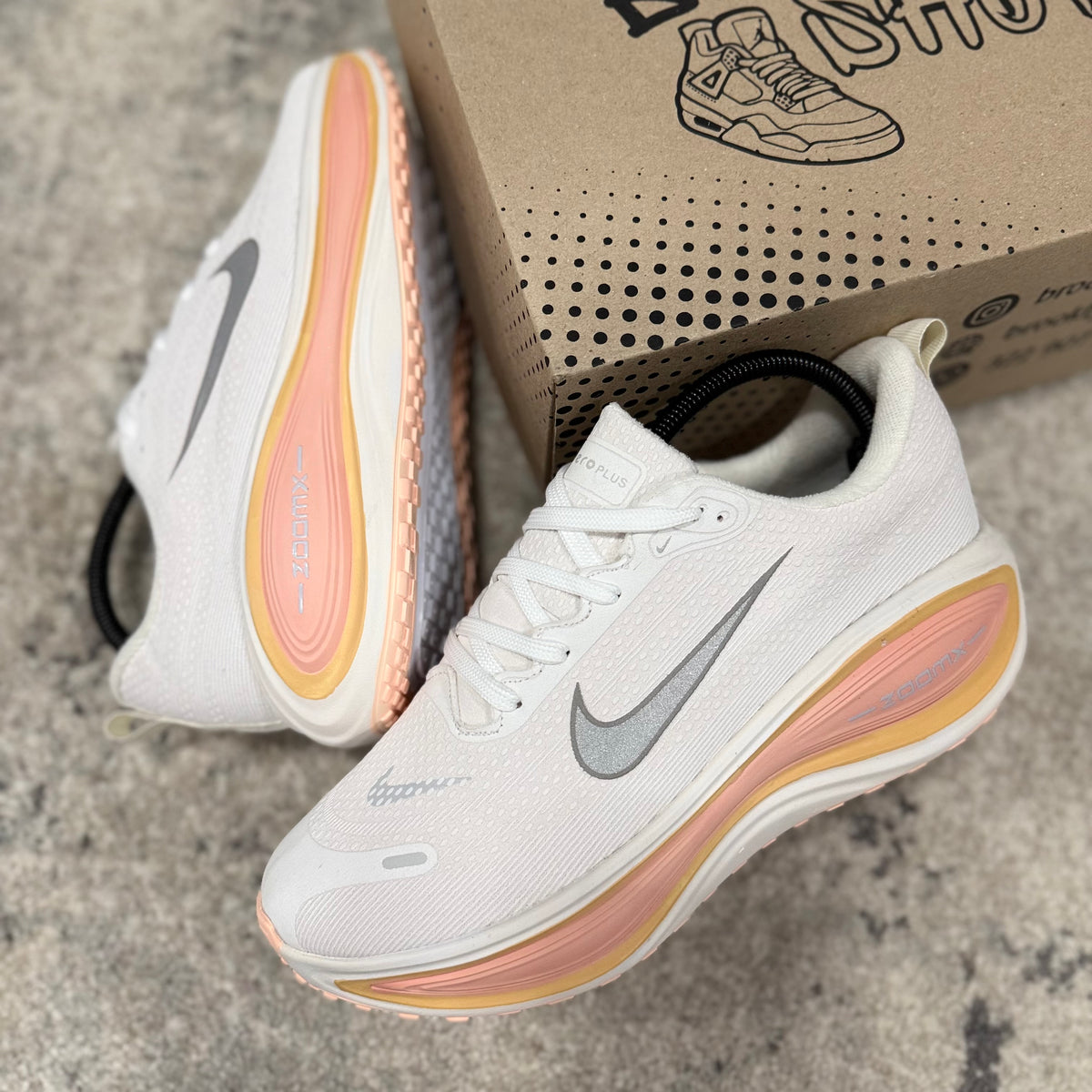 NIKE VOMERO PLUS - DAMA