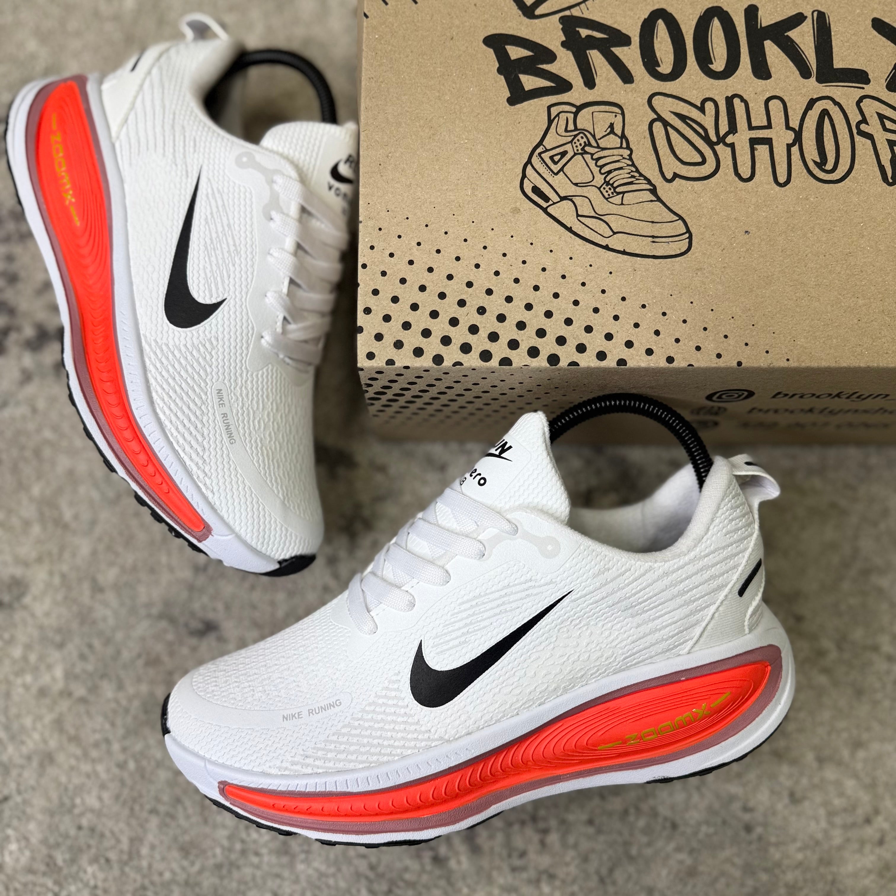 NIKE VOMERO 18 - BLANCO NARANJA