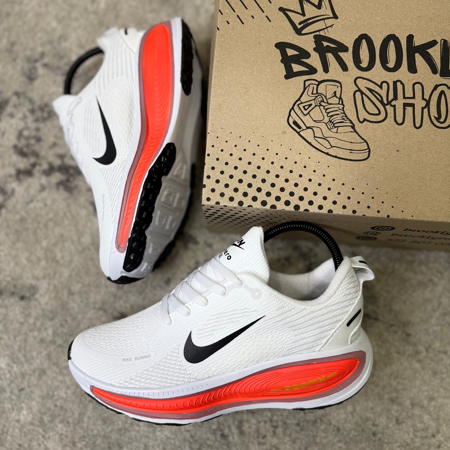 NIKE VOMERO 18 - BLANCO NARANJA