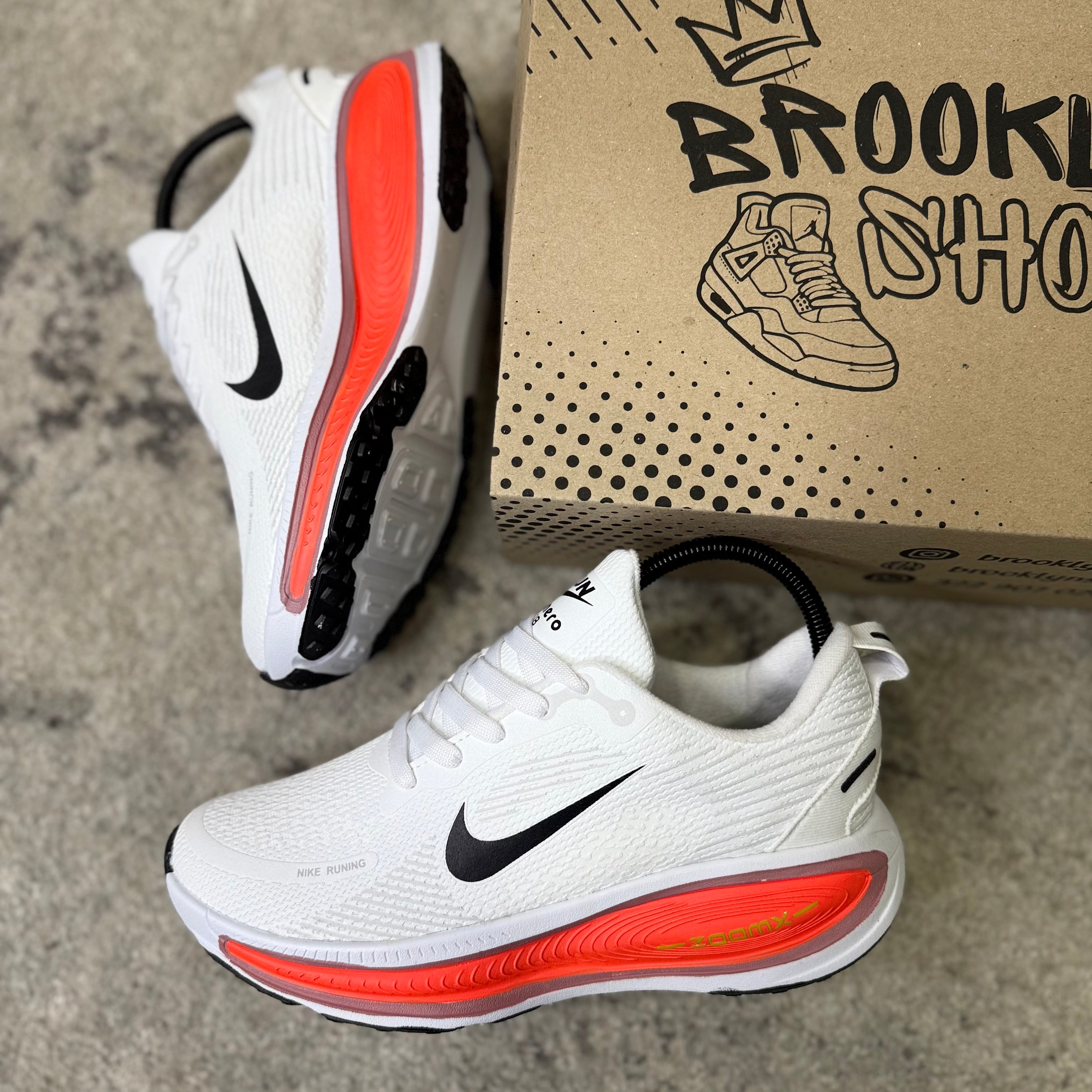 NIKE VOMERO 18 - BLANCO NARANJA